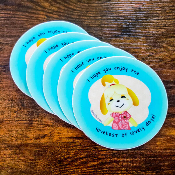 Stickers with Isabelle from Animal Crossing: New Horizons that say, "I hope you enjoy the loveliest of lovely days!"